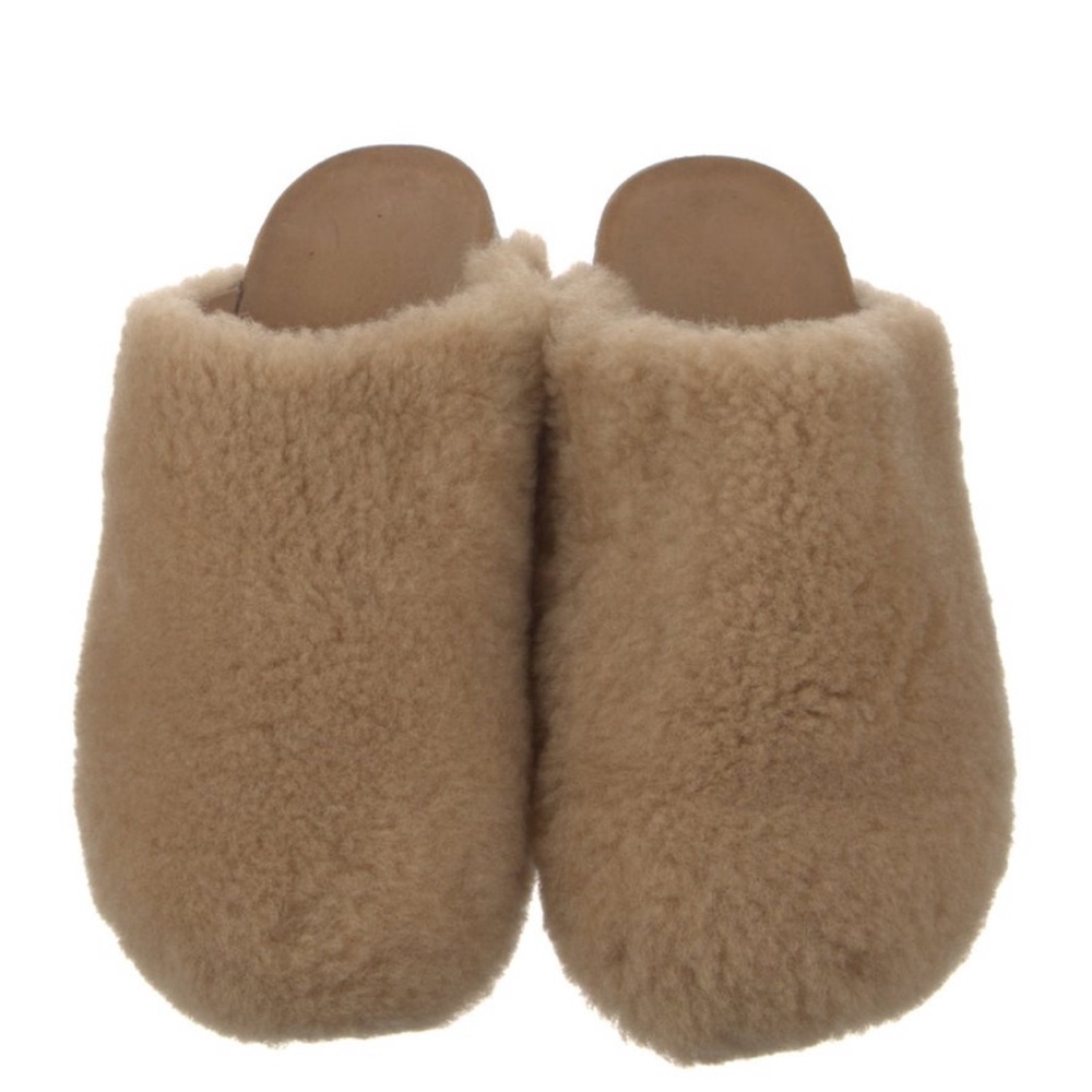 •   Jenni Kayne Shearling Mules
•   Neutrals
•   Round-Toes
•   Platform